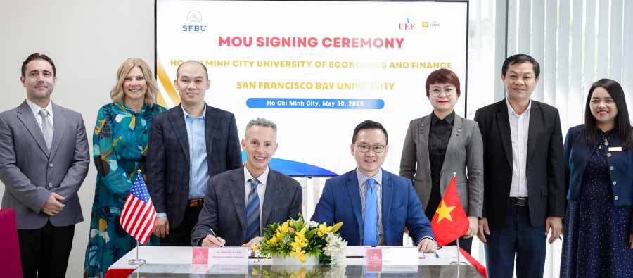 Jen Alessi, Assistant Provost for International Programs, Brad Fuster Provost and Vice President for Student Affairs meeting with Ho Chi Minh City University of Economics and Finance