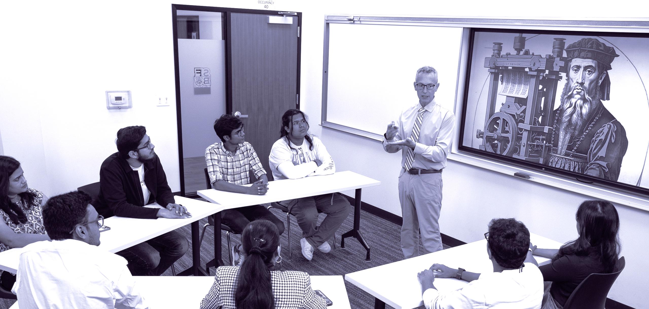 Teacher in front of lecture hall