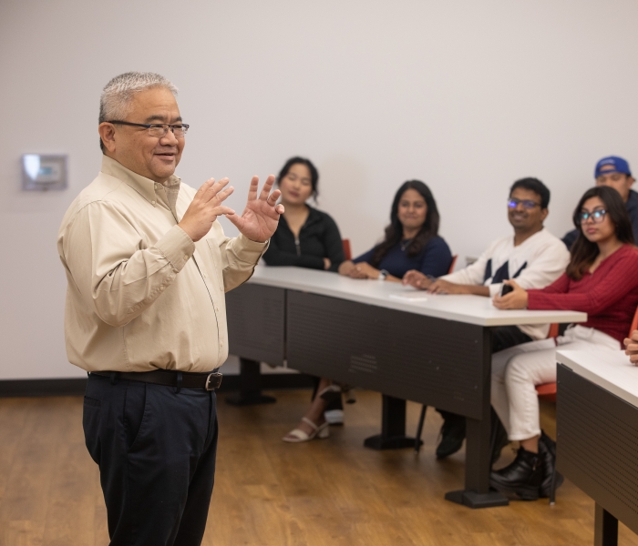 Teacher in front of lecture hall